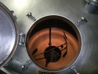 Brewer Brad looking into the 6000 gallon MDV brew kettle at the Stevens Point Brewery.